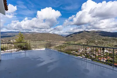 a balcony with a view of the mountains at Great property - amazing views in Limassol
