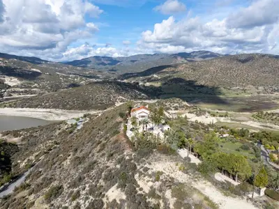 an aerial view of a house on a hill with mountains at Great property - amazing views in Limassol