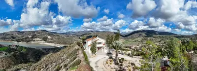 a house on a hill with a view of a mountain at Great property - amazing views in Limassol