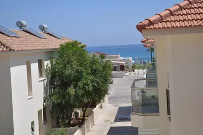 a view of a street between two buildings at Ivory Suite at Polyxenia - Tourism licence 03125 in Protaras
