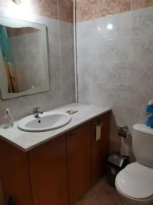 a bathroom with a sink and a toilet at Lovely house apartment 2 bedrooms wiht nice view in Voroklini