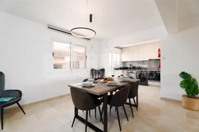 a dining room with a table and chairs at Apartment Anabelle in Paralimni