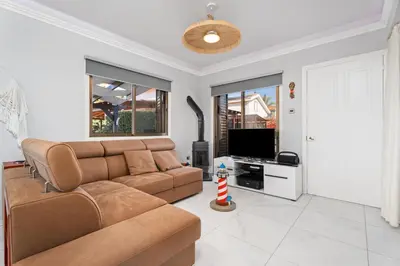 a living room with a couch and a tv at Ayia Napa Villa Jasmine Sirens Beach Dom na Cyprze in Ayia Napa