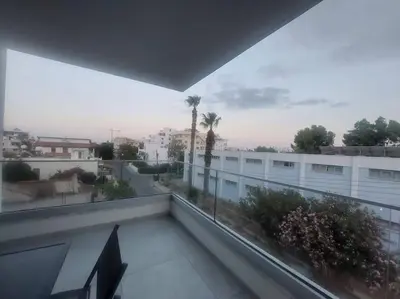 a balcony with a view of a city street at Luxury 2 bedroom apartment in Larnaka