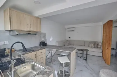 a kitchen with a sink and a counter top at Gold Emerging Villas Ltd Apart 2 in Ayia Napa