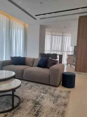 a living room with a couch and a table at 360 Nicosia-2 Bedroom City Tower in Nicosia