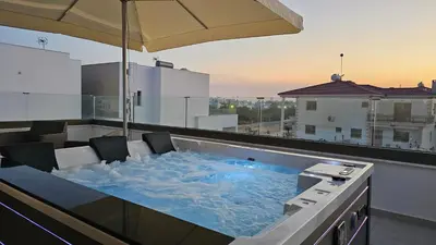 a hot tub on the roof of a building at STAY Oasis Luxury Villas in Ayia Napa