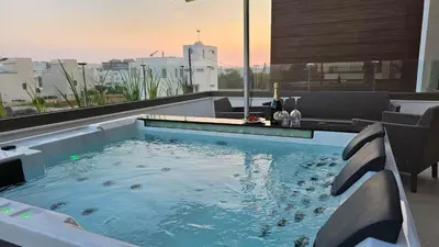 a large swimming pool on top of a building at STAY Oasis Luxury Villas in Ayia Napa