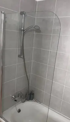a shower in a bathroom with a tub at Apartment Veronika in Paralimni