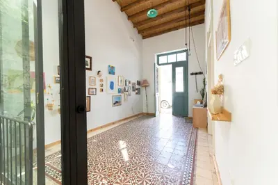 a hallway with a door and a tile floor at 1927 Heritage House - Indoor Garden , Old City in Nicosia