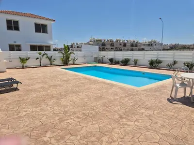 a pool on the roof of a house at Villa Amaryllis in Paralimni