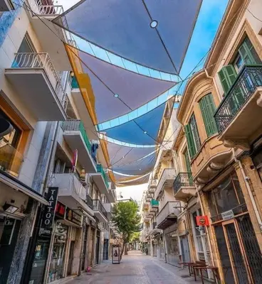 an umbrella is hanging over a city street at Spacious studio located in the pedestrian zone in Nicosia
