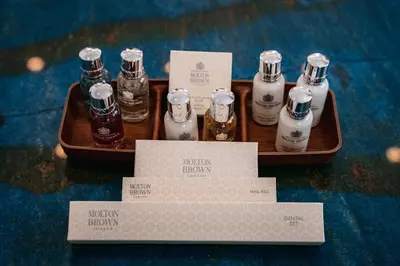 a tray with bottles of liquor on a table at TG NEW Luxury Private Resort & SPA Villas - Heated Salty Swimming Pool, Outdoor Jacuzzi, Sauna, Exotic Garden in Limassol