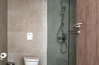 a bathroom with a shower with a toilet at Cyprotel Florida in Ayia Napa