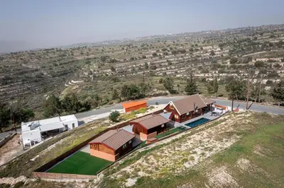 an overhead view of a house on a hill at Ktima To Alliotiko - Lofou 2 in Lofou
