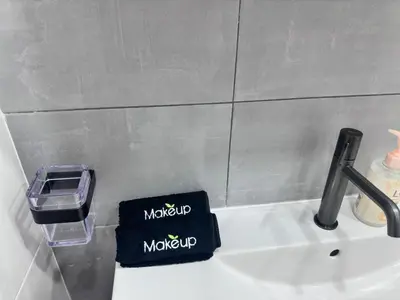 a bathroom sink with a faucet and a soap holder at Beautiful One Bedroom Apartment, 186 Meters to Beach, Central Location Next to Cafes & Bars in Limassol