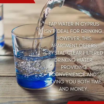 a glass of water pouring into a glass of water at Beautiful One Bedroom Apartment, 186 Meters to Beach, Central Location Next to Cafes & Bars in Limassol