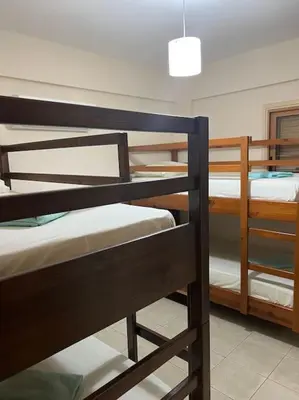 a group of bunk beds in a room at Palm Villa 3 bedrooms - Sleeps 6 in Ayia Napa