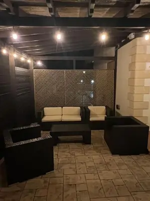 a living room with a couch and a table at Palm Villa 3 bedrooms - Sleeps 6 in Ayia Napa