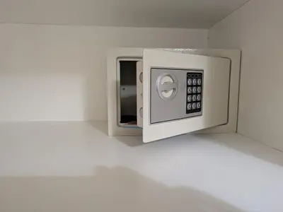 a white microwave oven sitting in a room at Kiti 2 bedroom Penthouse in Kiti