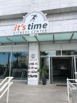 a store front of a fitness center with a sign at Ithaki Phinikoudes Apartment No. 204 in Larnaka