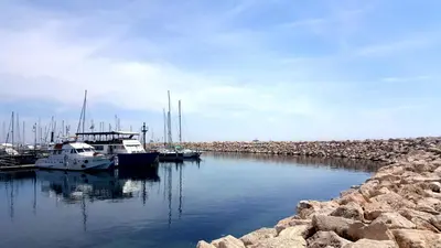 a group of boats docked in a harbor at Ithaki Phinikoudes Apartment No. 204 in Larnaka