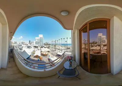 a large room with a view of a marina at Ithaki Phinikoudes Apartment No. 204 in Larnaka