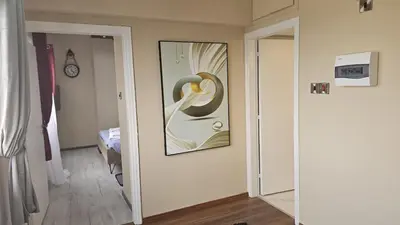 a room with a painting on the wall at STAY Van Gogh Apartment in Larnaka