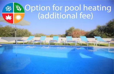 an image of a pool with the words option for pool heating additional fee at Akefalou Bay Villa in Protaras