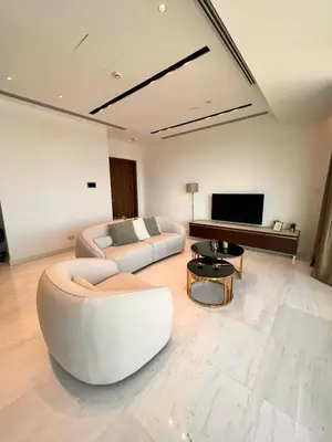 a living room with a white couch and a table at Nicosia 360 Luxury Living A in Nicosia