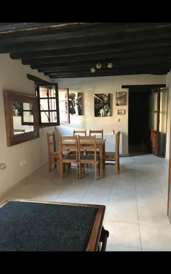 a dining room with a table and chairs at Clover Cottage in Limassol