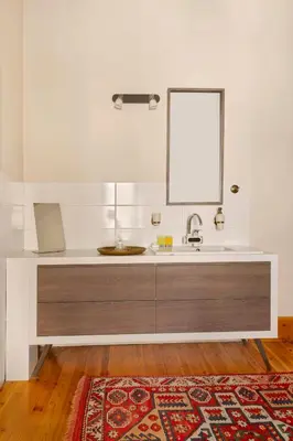 a bathroom with a sink and a mirror at Klokkari Stays - Cozy Stay City Center By Platform 357 in Nicosia