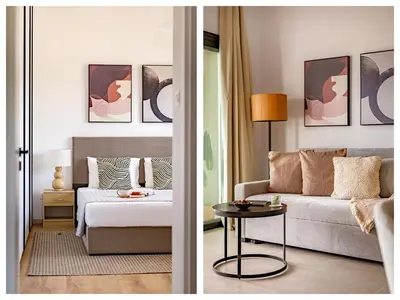 a living room with a couch and a table at Sanders Breeze Limassol in Limassol