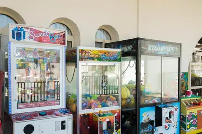 two arcade games are lined up next to each other at Tsokkos Paradise Holiday Village in Ayia Napa