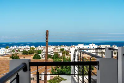 a view of a city from a balcony at Spitaki 2 BDR Apartment with Pool and Close Proximity to Beach in Paralimni