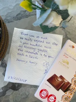a thank you note and a piece of paper with chocolate at Kyperounta Retreat in Kyperounda
