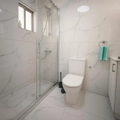 a white bathroom with a shower and a toilet at Limassol Centr Apartament in Limassol
