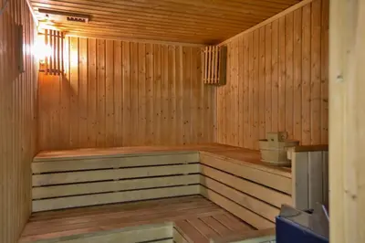 a wooden sauna with a bench in the middle at Obv 2304 in Pyla