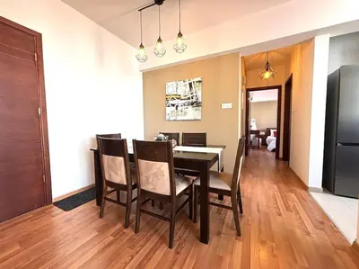 a dining room with a table and chairs at One Bedroom Flat in Central Nicosia in Nicosia