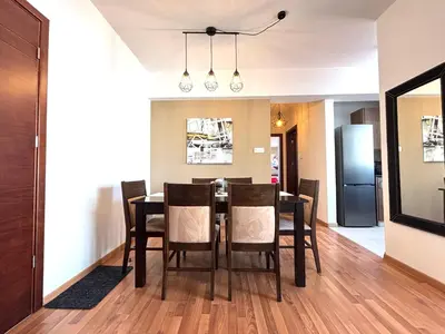 a dining room with a table and chairs at One Bedroom Flat in Central Nicosia in Nicosia