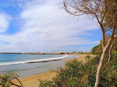 a beach with waves coming in from the ocean at Sea view Beach House with Pool in Limassol