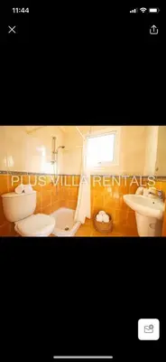 a bathroom with a toilet and a sink and a tub at Villa 4 Ayia Thekla in Ayia Napa
