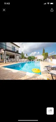 a picture of a swimming pool with a frisbee in it at Villa 4 Ayia Thekla in Ayia Napa