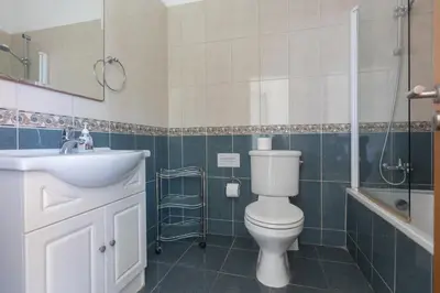 a bathroom with a toilet and a sink and a shower at Mylos Villas in Protaras