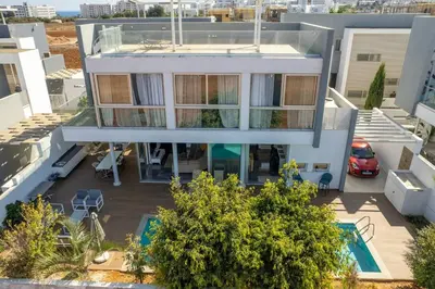 an aerial view of a house with a swimming pool at Hubstay - The Royal Palace Lux Private Pool in Protaras