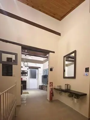 a room with a hallway with a kitchen and a hallwayngth at Finikous Cottage House-Agros in Agros
