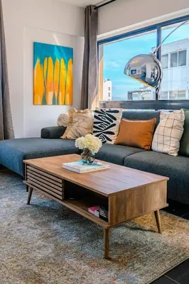 a living room with a couch and a coffee table at Element Stays City Suite in Nicosia
