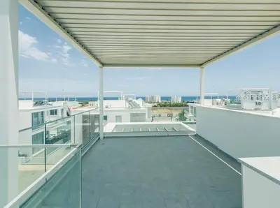 a balcony with a view of the city at Imperial Jade V4 - Villa Andriana in Protaras in Protaras