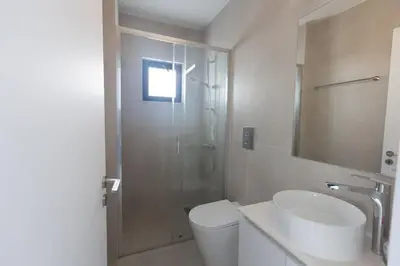 a bathroom with a shower and a toilet and a sink at Protaras Aqua Pearl Villa in Protaras