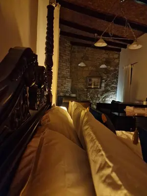 a close up of a bed in a room at The Courtyard Suite in Limassol